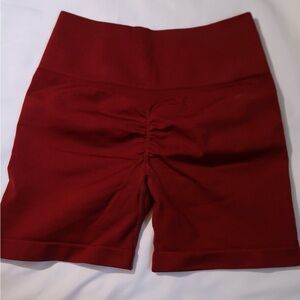 Like new, small burgundy gym shorts